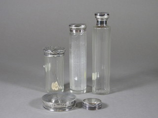 3 cylindrical glass pin jars with silver lids, London 1922 and 2 circular silver lids 2 1/2" and 1 1/2"