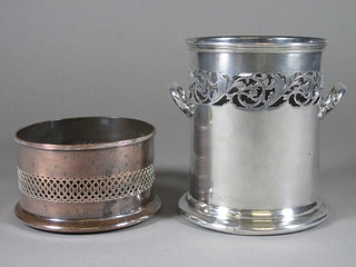A circular pierced silver plated soda siphon holder by Mappin &  Webb and a pierced silver plated bottle coaster