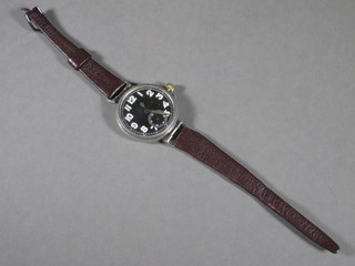 A silver cased wristwatch contained in a silver case