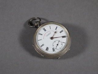 An open faced pocket watch - The Express English Lever by J G Greaves contained in a silver open case