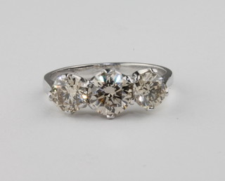 A lady's 18ct white gold dress ring set 3 circular cut diamonds, approx 1.84ct