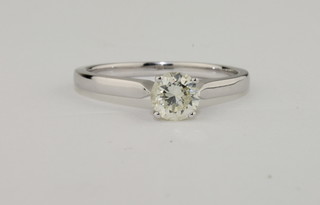 A lady's 18ct white gold solitaire diamond dress ring