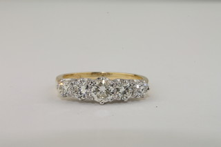 A lady's 18ct yellow gold dress ring set 5 diamonds, approx  1.30ct