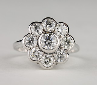 A lady's 18ct white gold cluster ring set diamonds  ILLUSTRATED