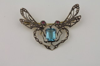 A brooch in the form of a dragonfly set rubies, diamonds and  aquamarine