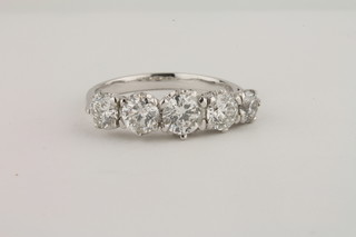 A lady's 18ct white gold dress ring set 5 diamonds, approx  1.66ct