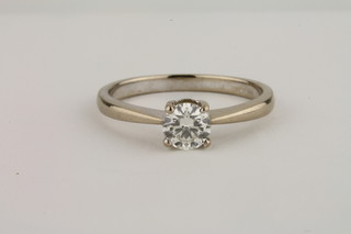 A lady's 18ct white gold dress ring set a solitaire diamond approx 0.75ct