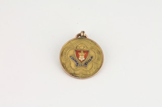 A 9ct gold and enamelled Amateur Football Association  medallion