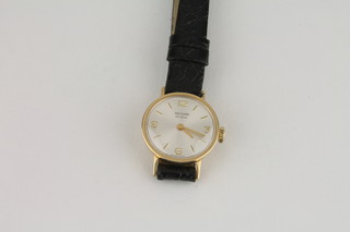 A lady's Record wristwatch contained in gold case
