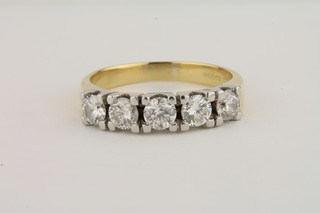 A lady's 18ct gold dress ring set 5 brilliant cut diamonds, approx  1.0ct