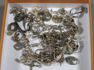 A collection of various silver costume jewellery