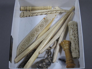 An ivory needle case, 2 pairs of ivory glove stretchers, 3 ivory handled letter openers etc