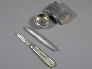 A silver match slip, a silver bladed fruit knife with mother of pearl grip, a silver mounted pencil and an Eastern salt