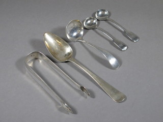 A pair of Georgian silver bright cut sugar tongs 1805, a pair of William IV silver fiddle pattern mustard spoons London 1837, a  silver Old English pattern sauce ladle Sheffield 1932 and a  Continental silver spoon 3 ozs