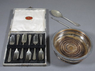 A circular silver plated bottle coaster, a nut pick and a set of 6 silver plated pastry forks etc