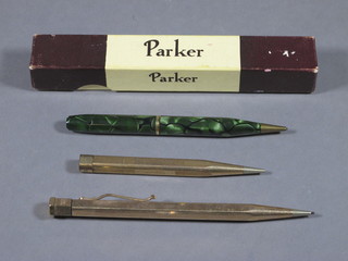 A Parker Vacumatic boxed, a Conway Stewart no.25 propelling  pencil in a green marble case, a Yard.O.Lead and a 1 other