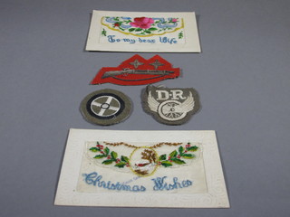 A Marksman's cloth badge, a driver's badge, 1 other and 2 WWI postcards