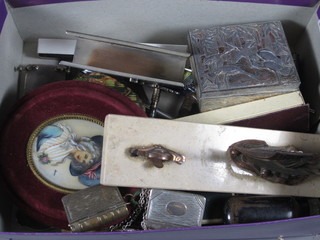 A silver plated vesta case in the form of a book, 2 silver plated decanter labels and other curios etc