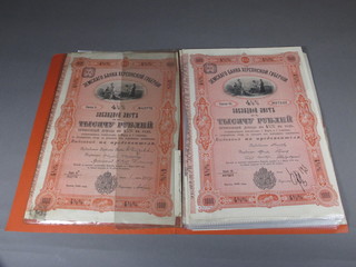 A collection of Imperial Russian bonds including 9 Banque  Foncier Du Gvmt De Kherson, a 1000 ruble bond dated 1898 - 1900
