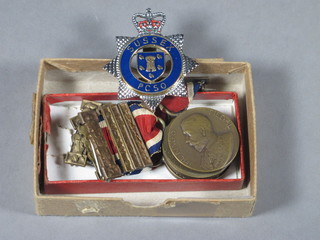 4 LCC School Attendance medals and a Sussex PCSO cap badge
