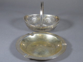 An oval silver plated basket 5 1/2" and an ashtray