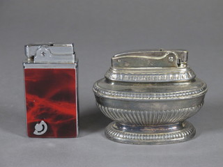 A Ronson Queen Anne style table lighter and a musical table  lighter