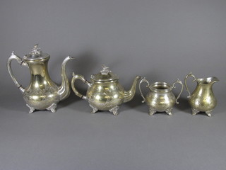 An engraved 4 piece silver plated tea/coffee service comprising teapot, coffee pot, twin handled sugar bowl and cream jug