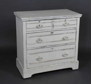 A Victorian white painted chest of 2 short and 2 long drawers  with brass drop handles, raised on bracket feet 32"