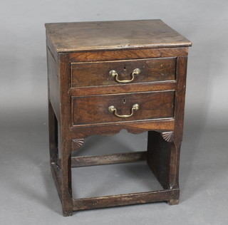 An 18th Century oak chest of 2 long drawers with brass swan  neck drop handles 20"