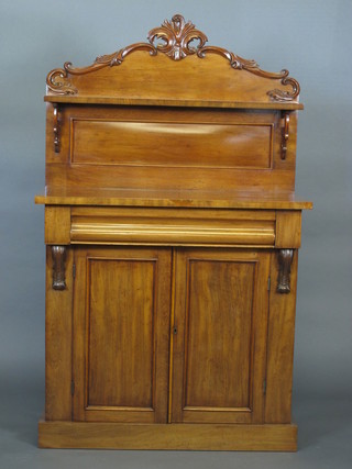 A Victorian mahogany chiffonier with raised back, the base fitted 1 long drawer above a double cupboard, raised on a platform base  36"
