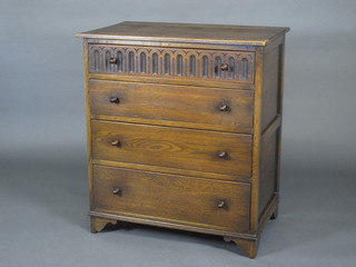 A carved oak chest of 4 long drawers with arcaded decoration, raised on bracket feet 30"