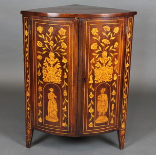 A 19th Century Dutch marquetry bow front corner cabinet fitted shelves enclosed by inlaid panelled doors, raised on square  tapering supports 26"