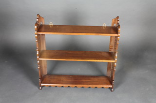 A 19th Century mahogany hanging 3 tier shelf 23"