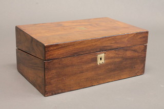 A Victorian walnut writing slope with hinged lid 14"