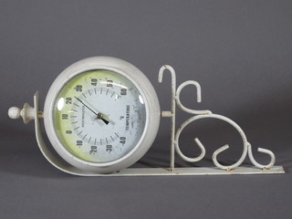 A metal wall mounting double faced garden clock/thermometer