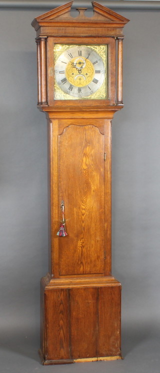 An 18th Century 8 day longcase clock, the 13" square brass dial  with gilt spandrels, subsidiary second hand and calendar aperture,  contained in an oak case 86"  ILLUSTRATED