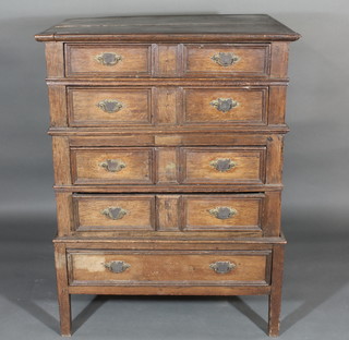 An 18th Century Continental oak chest on stand of 5 long  drawers with brass plate handles, raised on square supports, in 2  sections, 37"