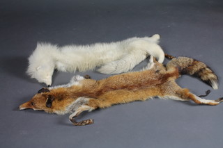 A white fox fur and 1 other