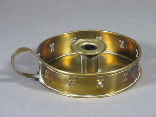 A 19th Century circular brass chamber stick 6"