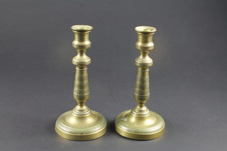 A pair of Empire style brass candlesticks with detachable sconces  8 1/2"