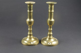 A pair of 19th Century brass candlesticks 10"