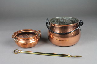 A circular copper pot with iron handle 7", a twin handled circular copper planter 5" and a brass telescopic toasting fork