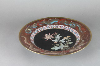 A Japanese cloisonne enamelled charger decorated dragons 12"