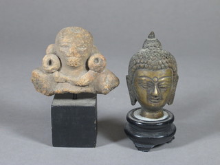 An Ancient terracotta portrait bust 2" together with an Oriental  bronze bust Buddha 2"