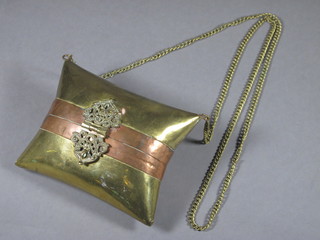 An Eastern copper and brass cushion shaped bag 5"