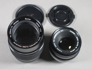 A Canon lens FD50mm 1:1.8 S.C together with a Vivitar auto telescopic close focus lens 135mm 1:2.8