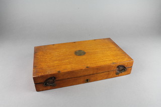A honey oak pistol box with hinged lid 13"