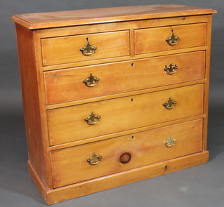 A stripped and polished pine chest of 2 short and 3 long drawers  with brass swan neck drop handles, raised on a platform base 41  1/2"