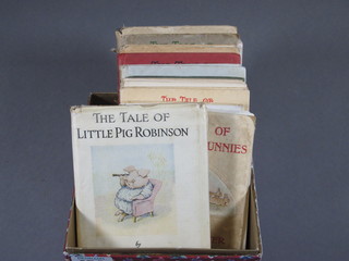 9 various editions of Beatrix Potter books