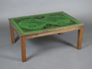 A rectangular mahogany and brass banded military style coffee table, the top set a Globe of the World 34"